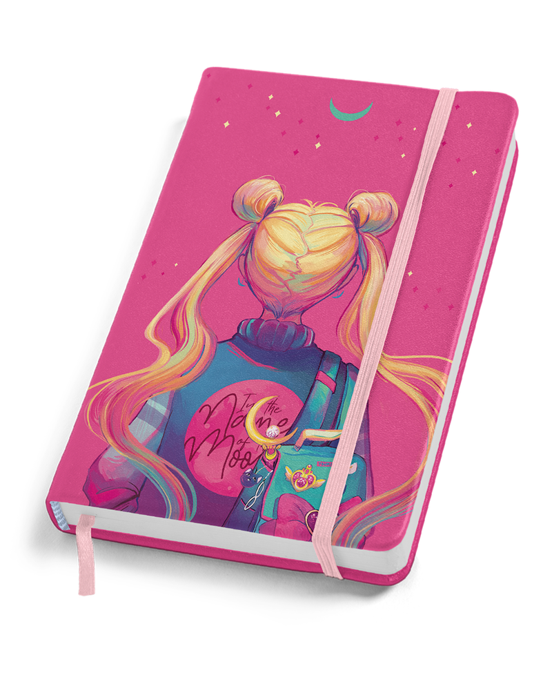 Pink notebook with anime-inspired art of girl with blonde twin buns, crescent moon, from GDBEE.ART