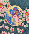 Colorful GDBee moon and city embroidered patch on denim with pink floral embroidery